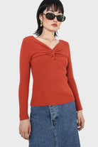 Orange cross front chest knit top_1