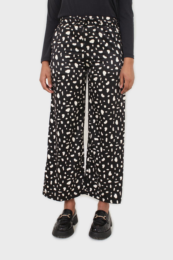 Black and white blotch print satin loose fit trousers_1