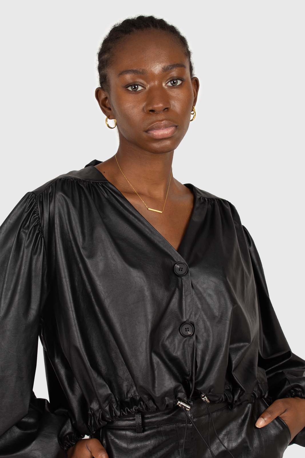 Black vegan leather v-neck puff sleeved blouse_4
