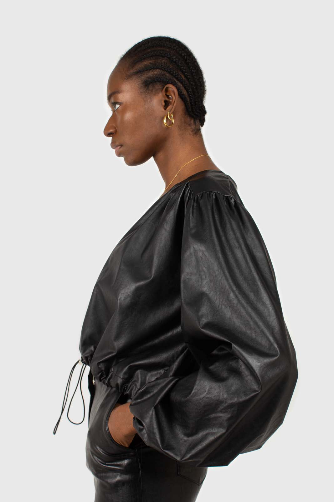 Black vegan leather v-neck puff sleeved blouse_1