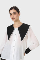 Ivory and black oversized pointed collar blouse_7