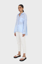 Blue asymmetric buttons shirt_5