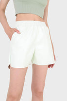 Mint green vegan leather shorts_1