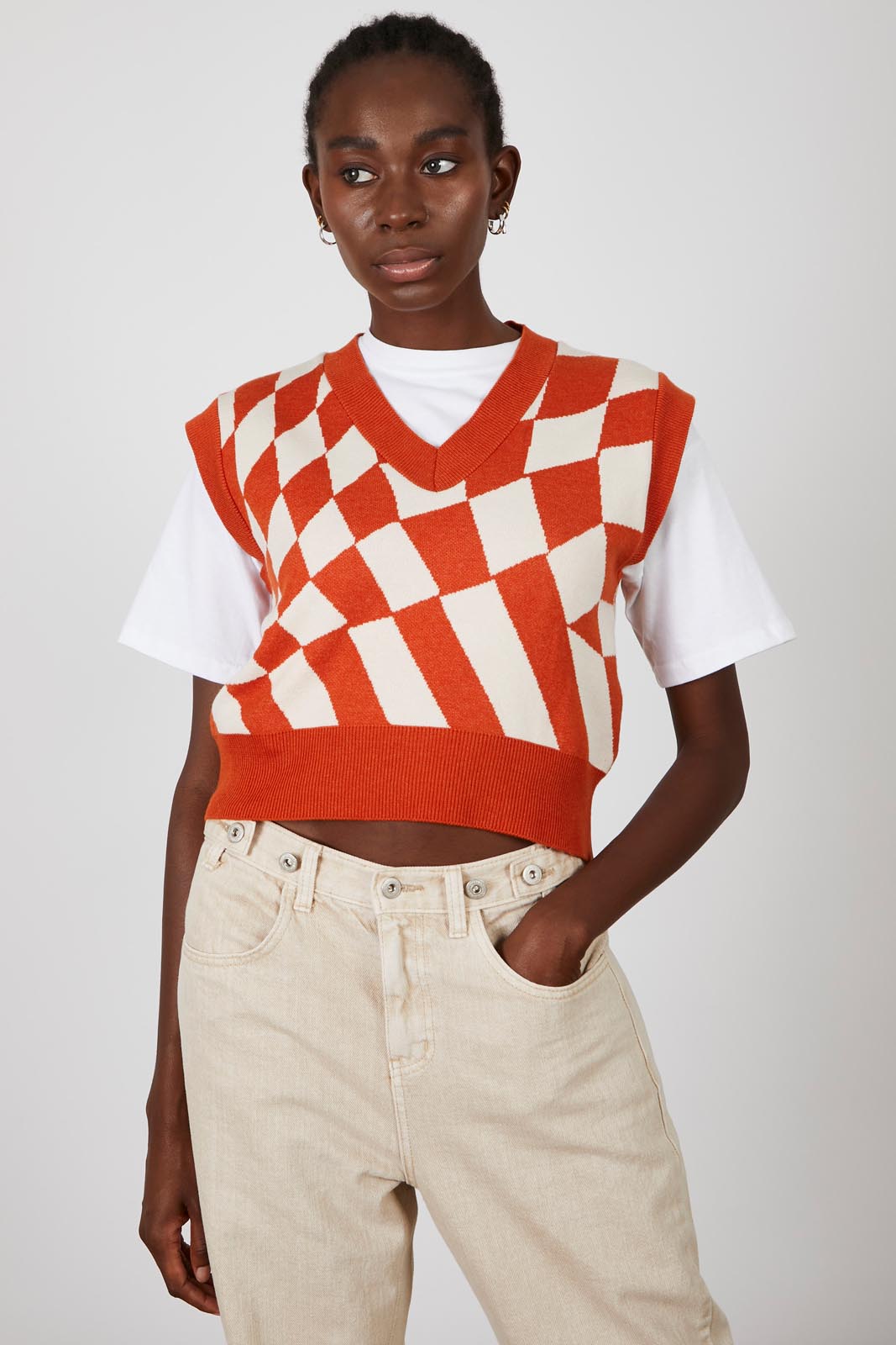 Orange and ivory psychedelic intarsia sweater vest_1