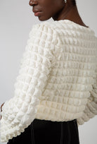 Cream textured puff long sleeved top_1