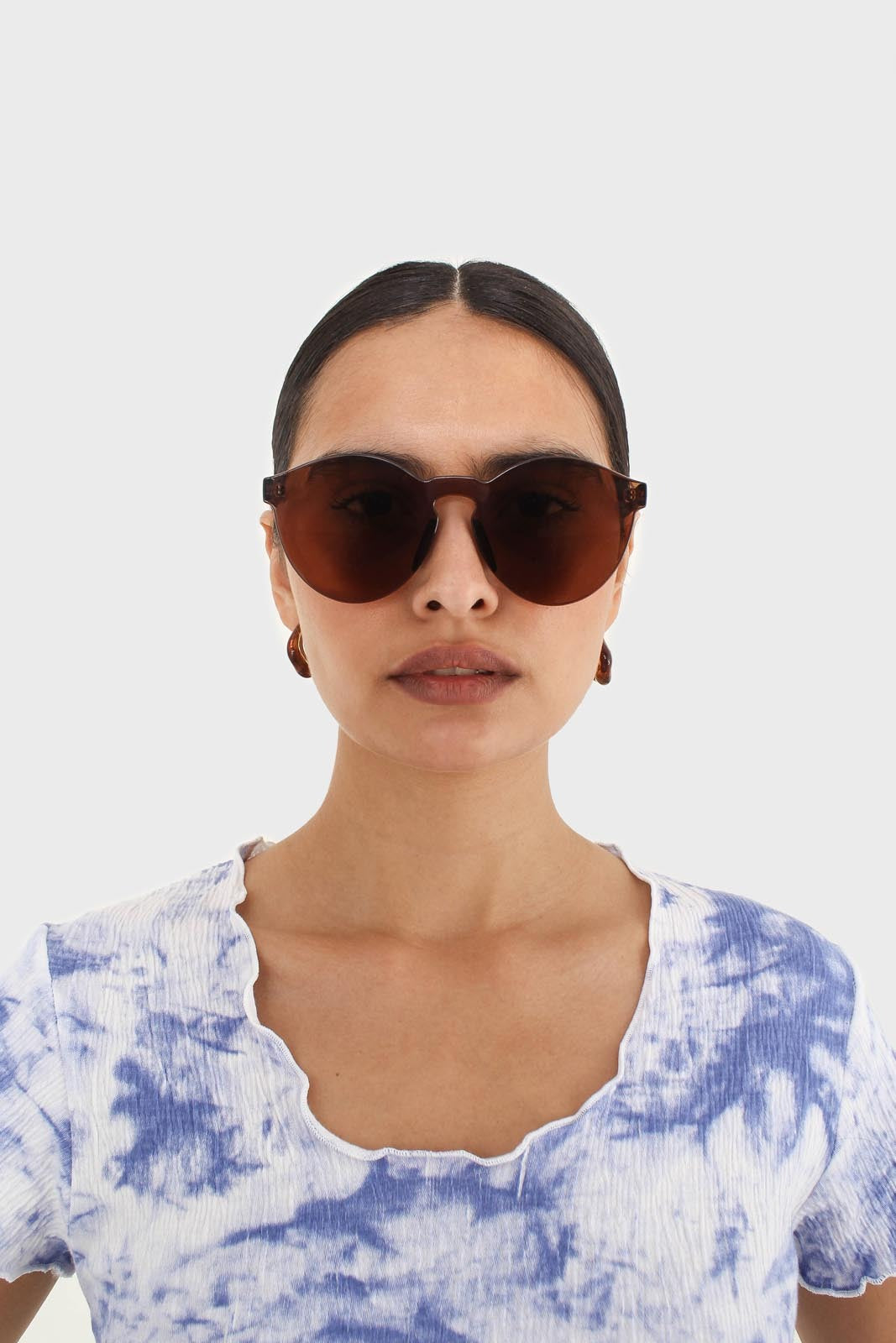 Brown frameless round sunglasses