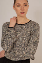 Ivory and black leopard print cropped long sleeved top_1