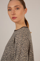 Ivory and black leopard print cropped long sleeved top_3