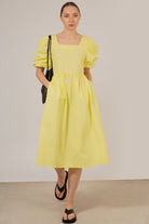 Yellow puff sleeve button back midi dress_1