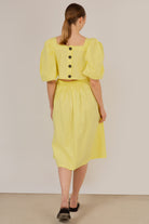 Yellow puff sleeve button back midi dress_5