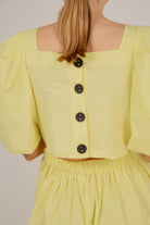 Yellow puff sleeve button back midi dress_10