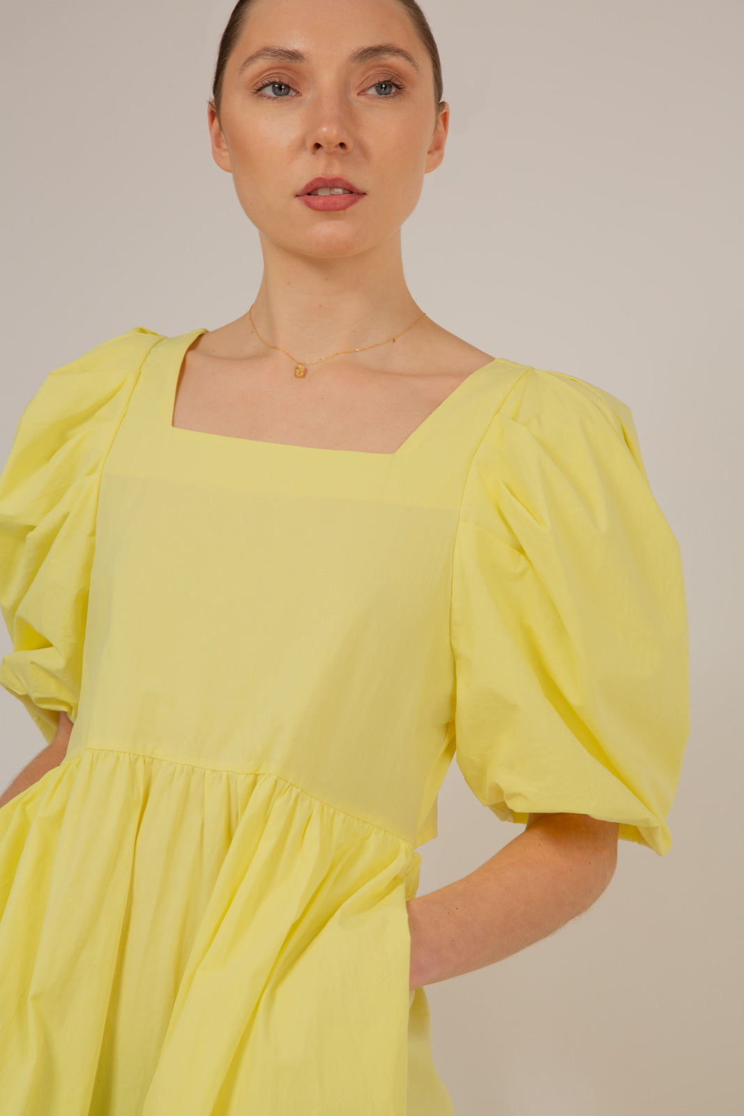 Yellow puff sleeve button back midi dress_9