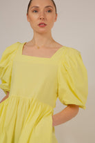 Yellow puff sleeve button back midi dress_9