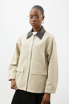 Beige and black vegan leather contrast collar parka_2