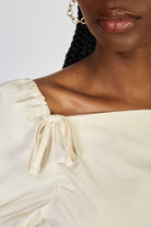 Beige double bow puff short sleeve top_3