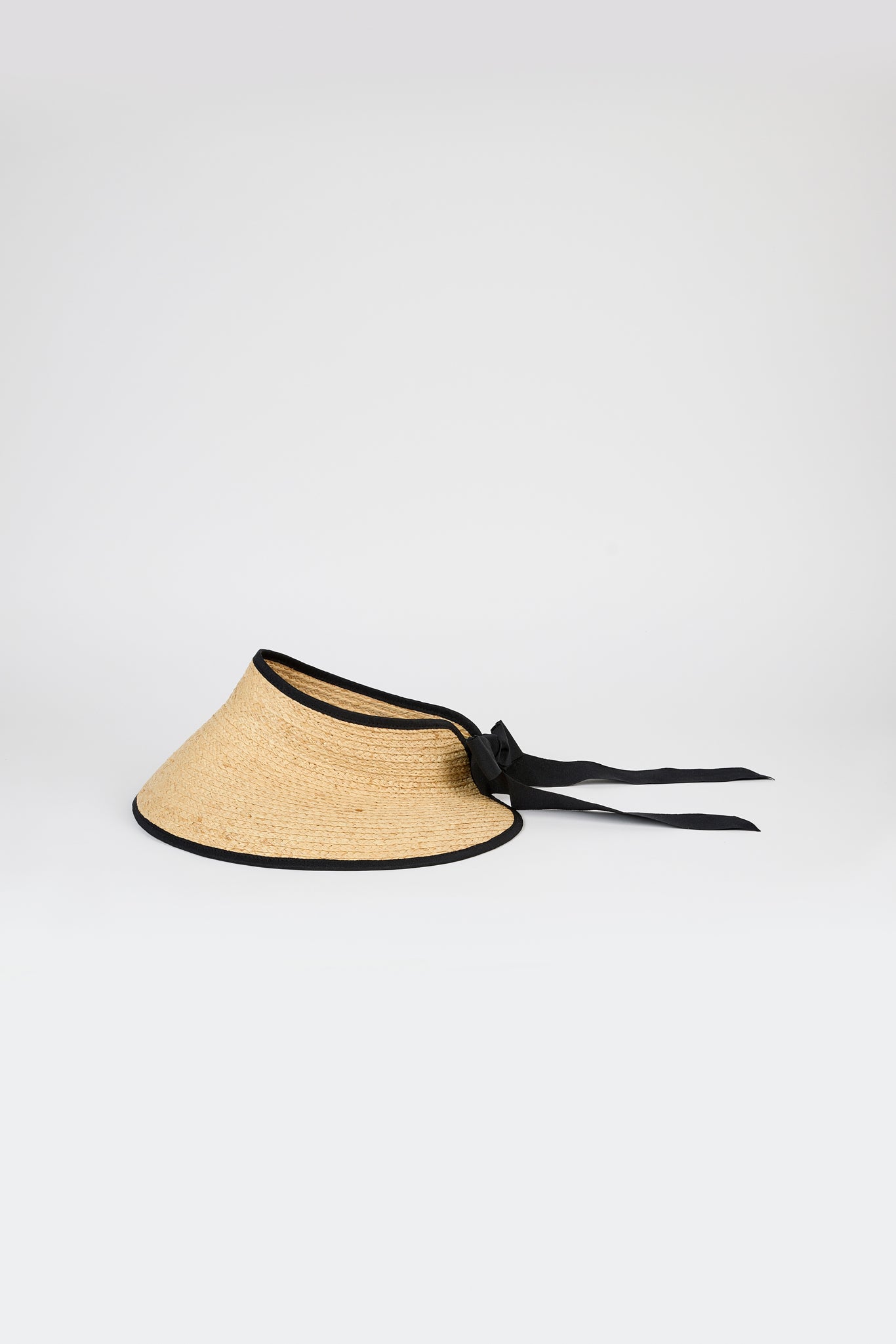 Beige raffia and black trimmed ribbon tie bonnet_1