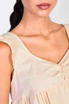 Beige ruffle trim tie back tank_3