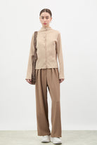 Beige textured button up mock neck top_4