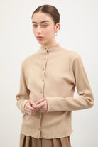 Beige textured button up mock neck top_1