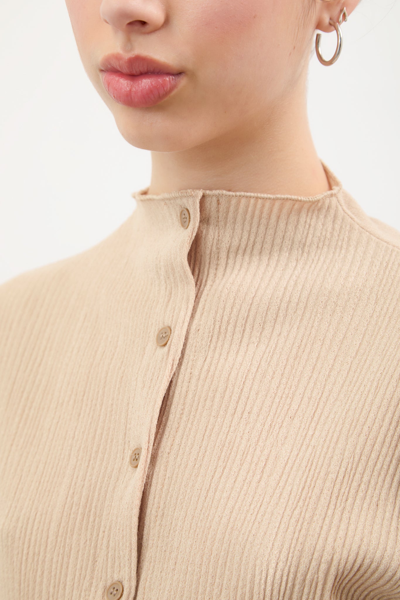 Beige textured button up mock neck top_3