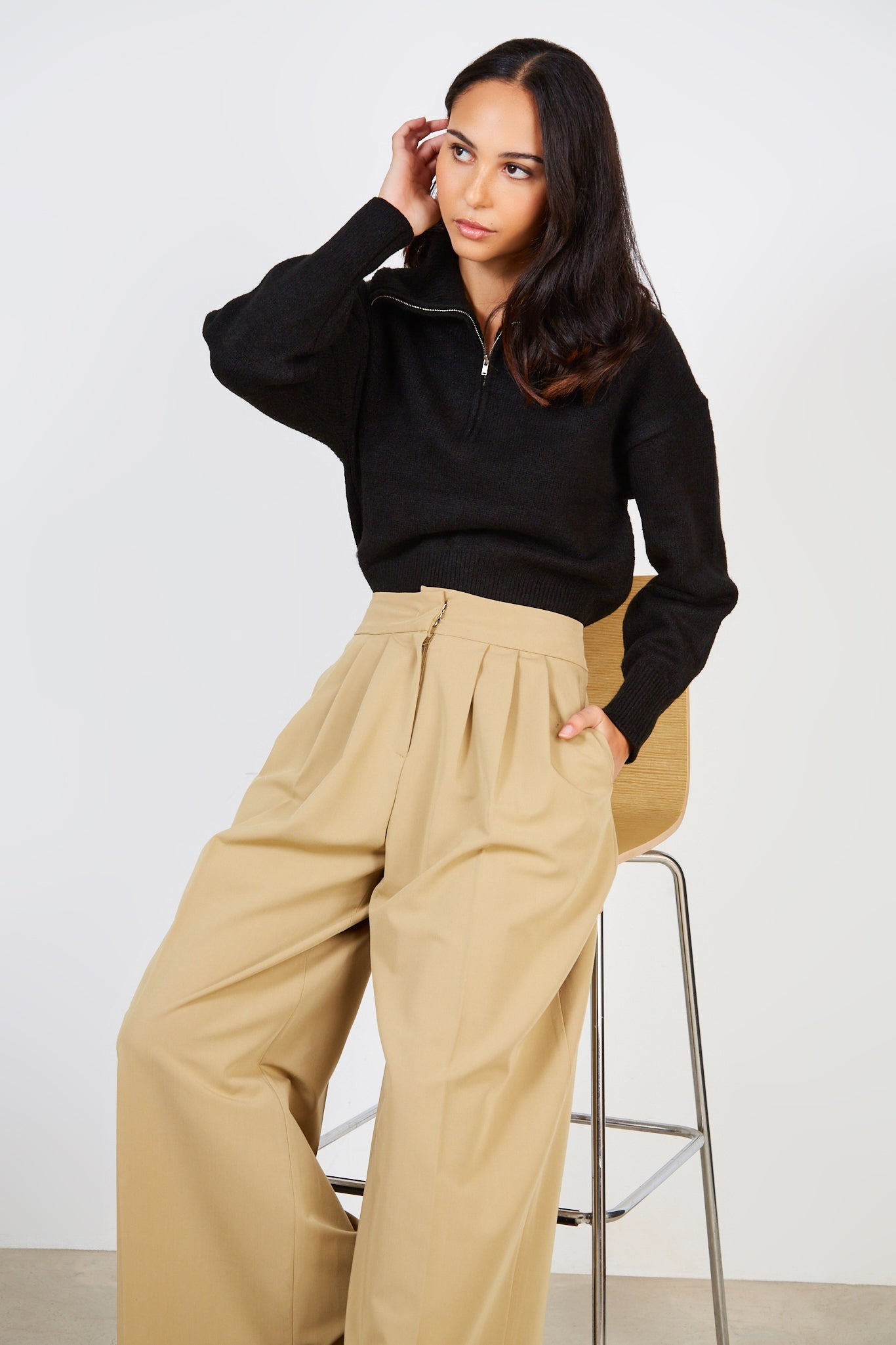 Beige pleated trousers