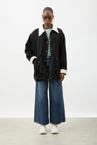 Black and ivory contrast collar cinch waist parka_5