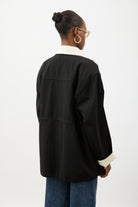 Black and ivory contrast collar cinch waist parka_3