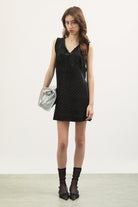 Black and ivory polka dot ruffle trim tie back mini dress_1