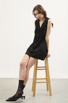 Black and ivory polka dot ruffle trim tie back mini dress_5