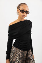 Black draped shoulder long sleeve knit top_1
