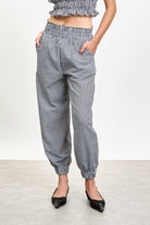 Black gingham cuffed trousers_1