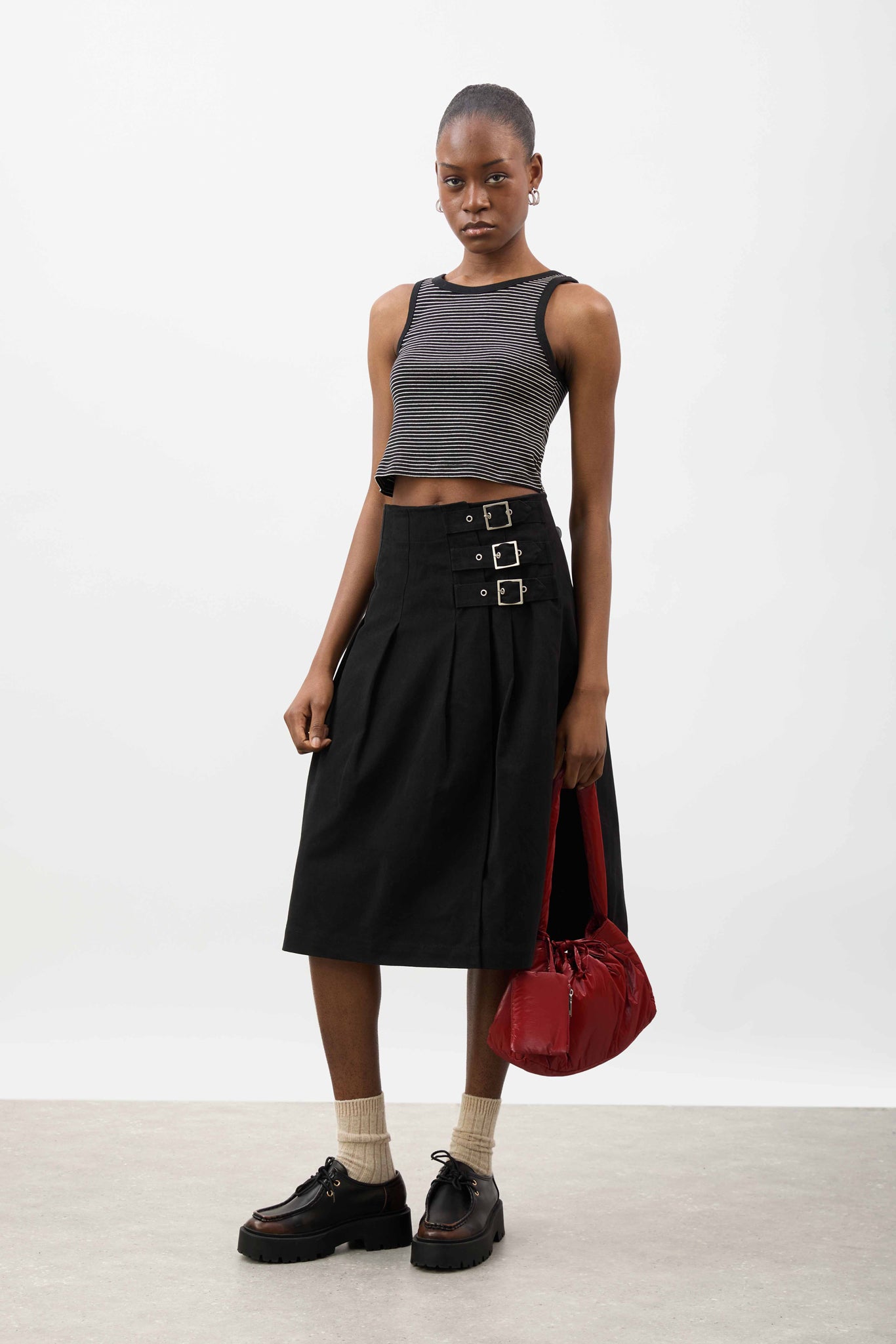 Black pleated triple buckle kilt midi skirt | Glassworks London