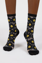 Black sheer daisy smiley face socks_2