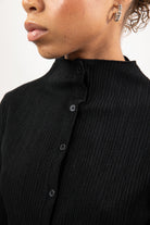 Black textured button up mock neck top_3