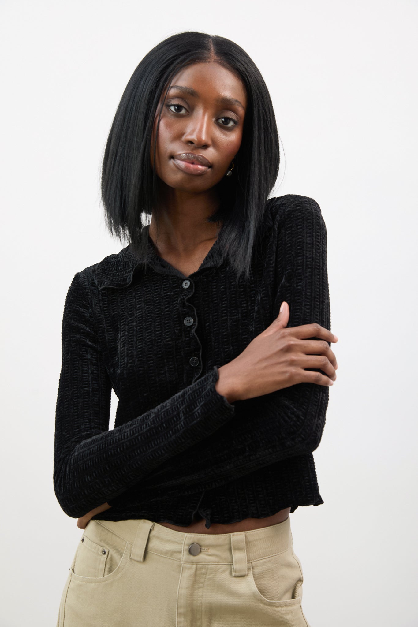 Black textured velvet ruffle trim long sleeve top_1