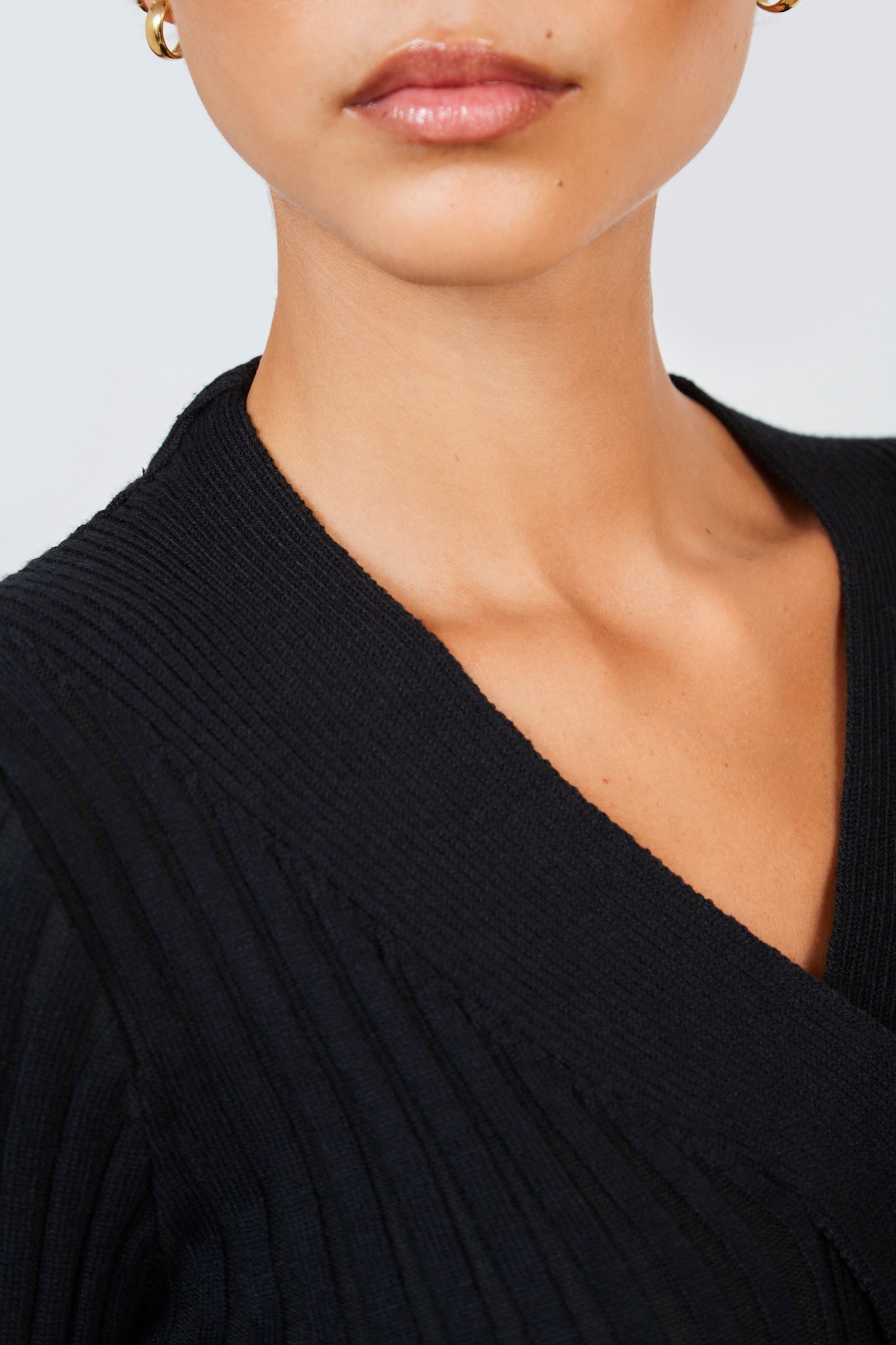 Black ribbed cableknit strip knit top