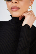 Black ribbed mock neck ruffle trim top_3