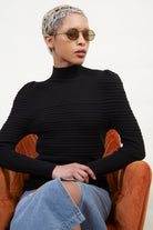 Black ribbed puff sleeve knit top_5