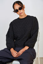 Black textured bubble long sleeved top_5