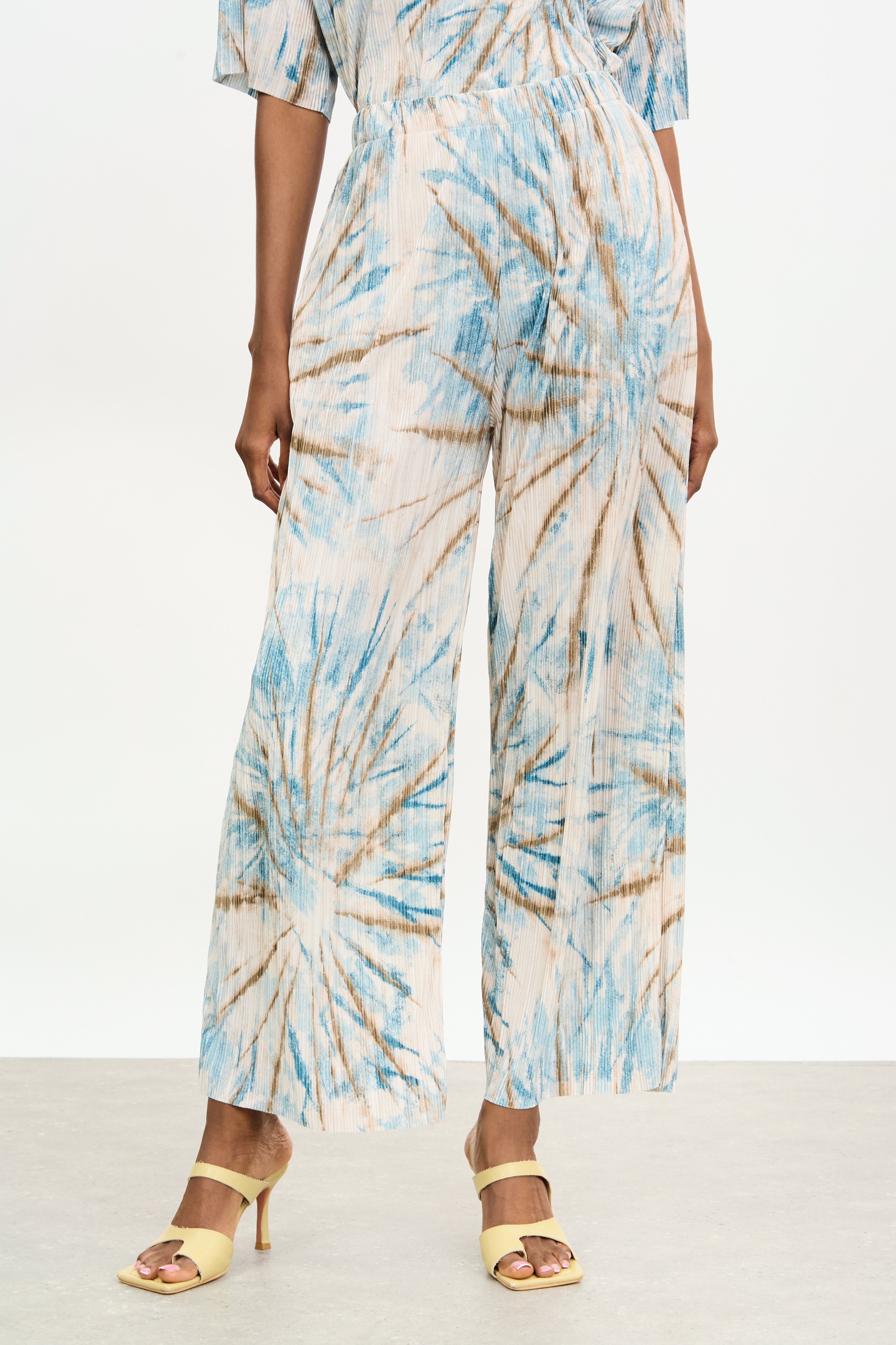 Blue and brown tie dye print ribbed trousers_1