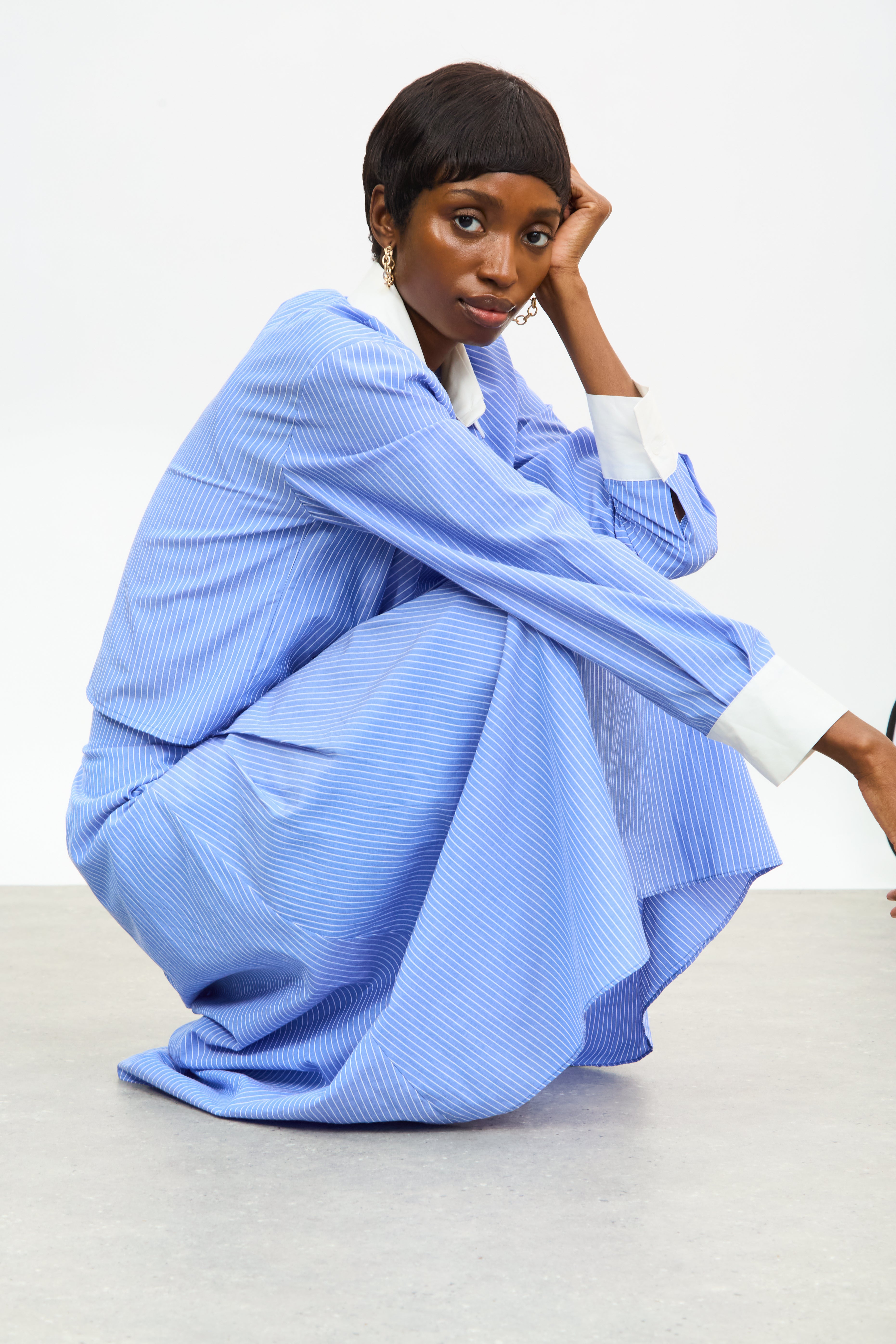 Bright blue and white stripe pleated midi skirt | Glassworks London