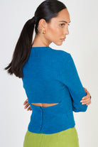 Bright blue ribbed knit peek back top_1