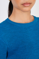 Bright blue ribbed knit peek back top_3