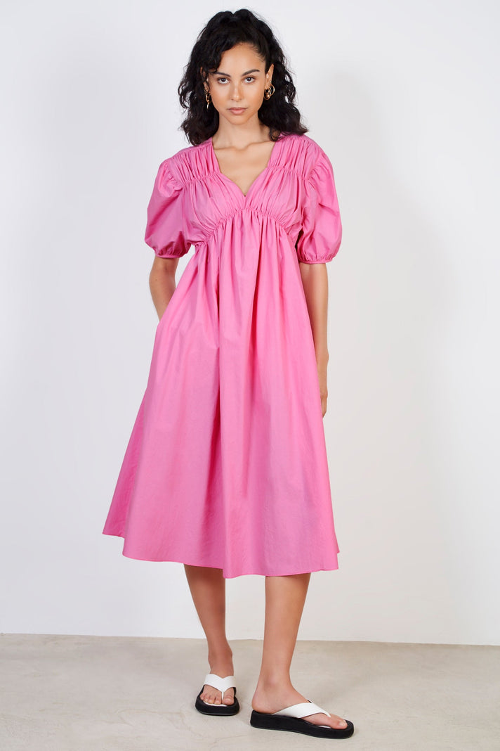 Bright pink ruched seam V neck dress