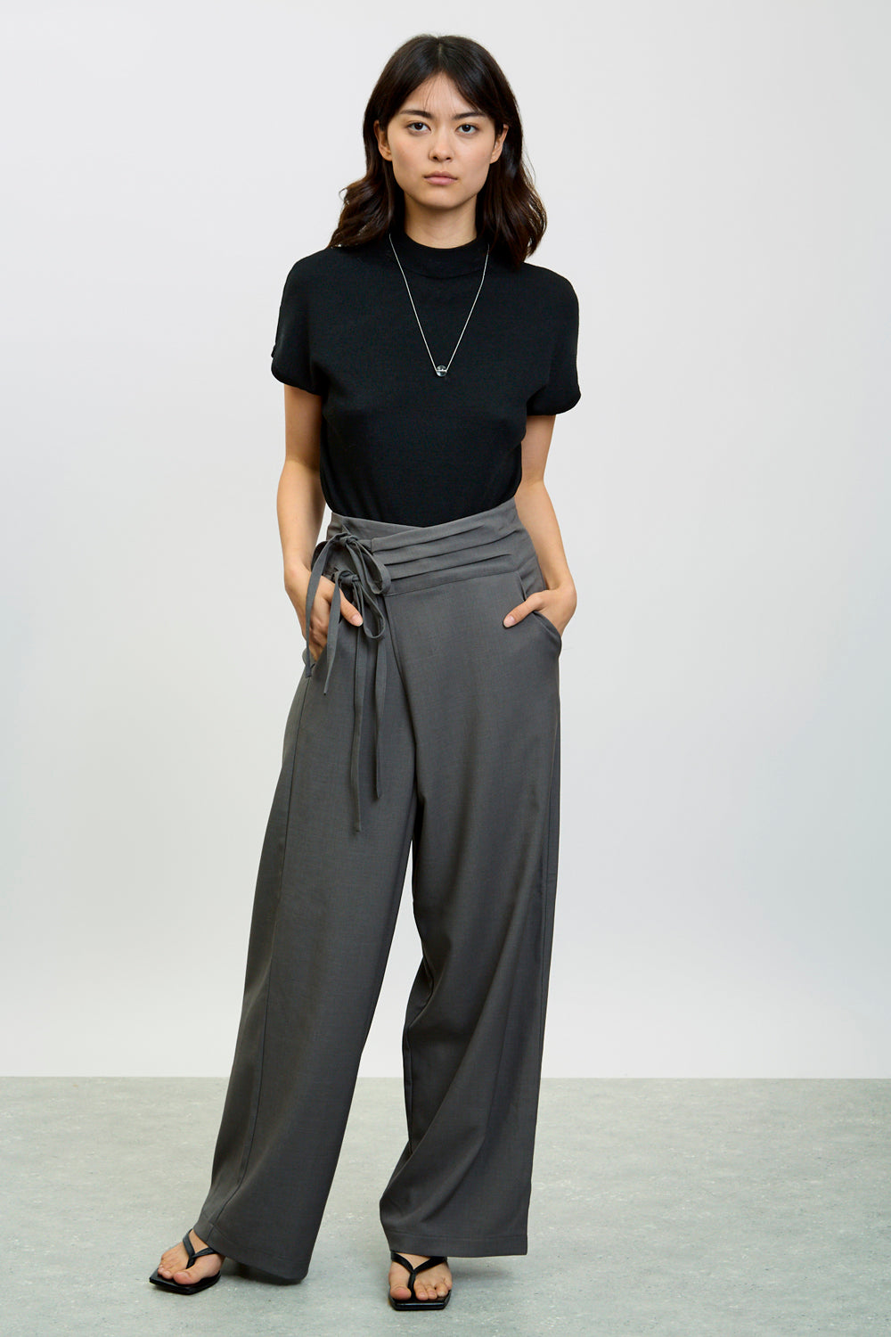 Charcoal asymmetric tie up trousers | Glassworks London
