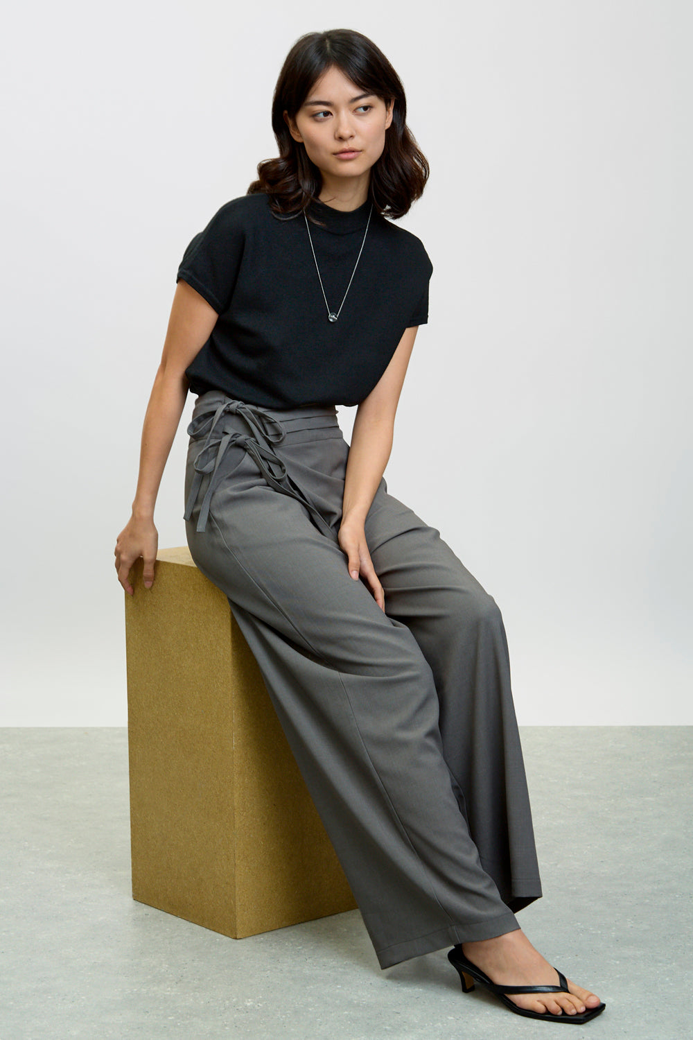 Charcoal asymmetric tie up trousers | Glassworks London