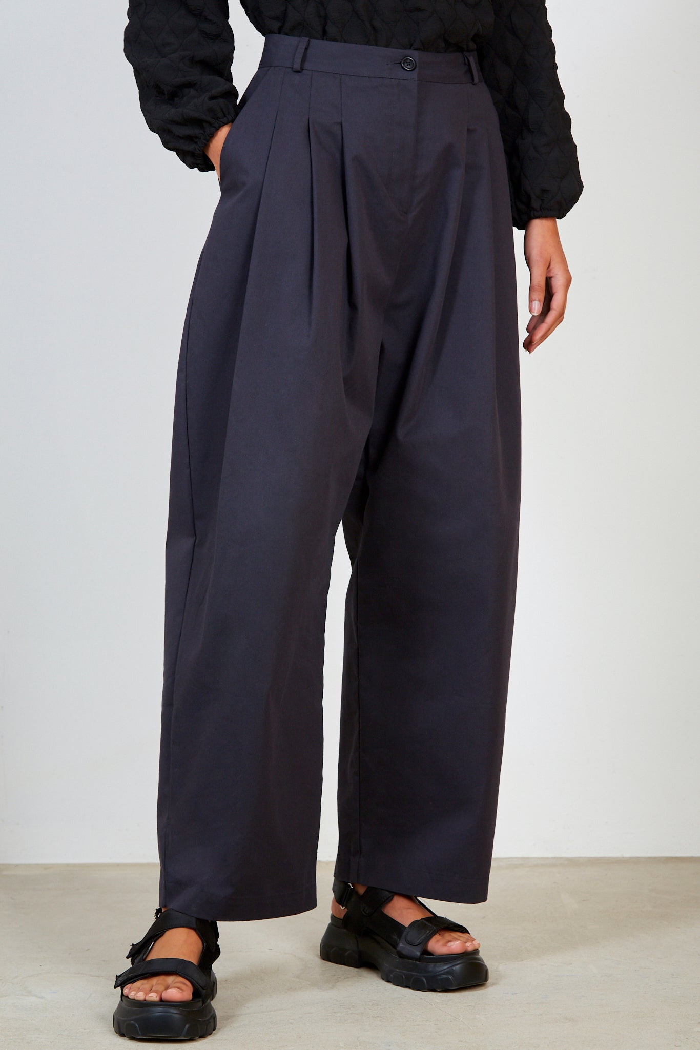 Navy multipleat trousers