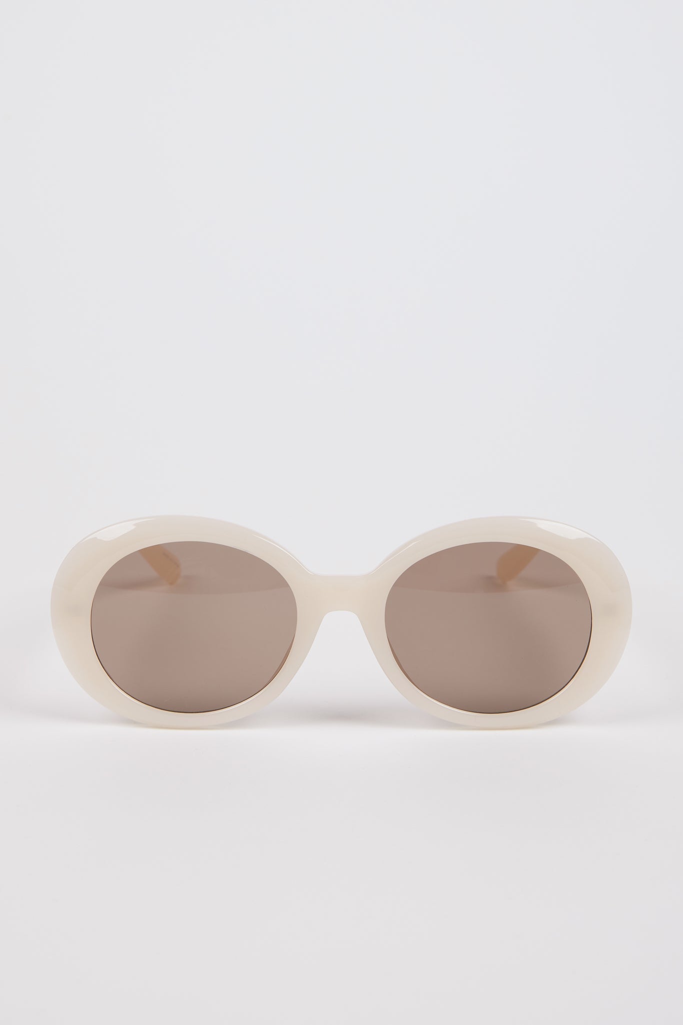 Cream and brown lens round sunglasses