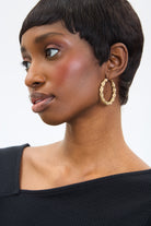 Gold large twisted hoop earrings_3