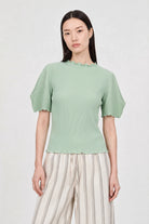 Green ribbed mock neck blouson sleeve top_1